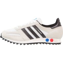 Adidas Originals LA TRAINER OG Tenisówki i Trampki vintage white/core black/clear brown. Białe tenisówki damskie marki adidas Originals, z materiału. Za 399,00 zł.