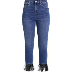 Topshop JAMIE Jeans Skinny Fit middenim. Niebieskie rurki damskie marki Topshop. W wyprzedaży za 202,30 zł.