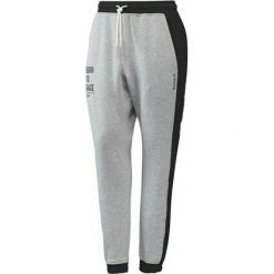 Reebok Les Mills Dance Pant BJ9622. Szare spodnie damskie Reebok, m, z bawełny. W wyprzedaży za 129,99 zł.