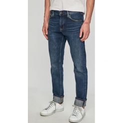Tommy Hilfiger - Jeansy. Niebieskie jeansy męskie TOMMY HILFIGER, z aplikacjami. W wyprzedaży za 359,90 zł.