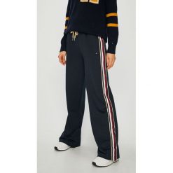 Tommy Hilfiger - Spodnie Tommy Icons. Niebieskie spodnie damskie TOMMY HILFIGER, s, z bawełny, z podwyższonym stanem. W wyprzedaży za 399,90 zł.