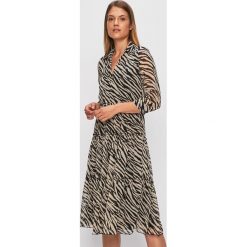 Answear - Sukienka. Sukienki damskie ANSWEAR, na co dzień, s, bez wzorów, z tkaniny, casualowe, bez kołnierzyka, bez rękawów, rozkloszowane. Za 149,90 zł.