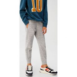Mango Kids - Spodnie dziecięce Jumbo 110-164 cm. Szare spodnie chłopięce Mango Kids, bez wzorów, z bawełny, casualowe. W wyprzedaży za 49,90 zł.
