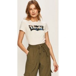 Levi's - T-shirt. Białe bluzki damskie Levi's®, s, z nadrukiem, z bawełny, z okrągłym kołnierzem. Za 129,90 zł.