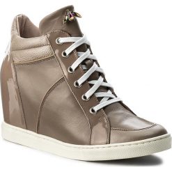 Sneakersy GINO ROSSI - Taniko DTH541-Z54-0241-3231-0 19/80. Pomarańczowe półbuty damskie marki Gino Rossi, bez wzorów, ze skóry, bez obcasa, na koturnie, bez zapięcia. W wyprzedaży za 279,00 zł.
