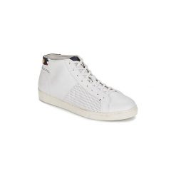 Buty Faguo ASPEN. Białe trampki i tenisówki damskie marki Faguo, bez wzorów, bez zapięcia. Za 423,20 zł.