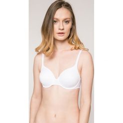 Triumph - Biustonosz Stepy Soft 01 Whp. Białe biustonosze soft cup marki Triumph, z haftami, z elastanu. Za 139,90 zł.