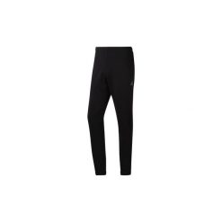 Spodnie treningowe Reebok Sport Spodnie Training Essentials Cuffed. Czarne spodnie męskie Reebok Sport, s, bez wzorów, sportowe. Za 118,30 zł.