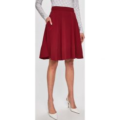 Calvin Klein - Spódnica. Brązowe spódniczki damskie Calvin Klein, bez wzorów, z poliesteru, z podwyższonym stanem, midi, rozkloszowane. Za 679,90 zł.