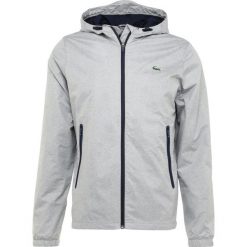Kurtki sportowe męskie: Lacoste Sport Kurtka przeciwdeszczowa nimbus/marine medway