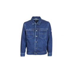 Kurtki jeansowe Tommy Jeans OVERSIZED TRUCKER SLMR. Niebieskie kurtki męskie Tommy Jeans, s, bez wzorów, z jeansu, bez kaptura. Za 365,40 zł.