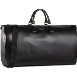 Torba GUESS - TMDNPU P0335 BLA. Czarne torby męskie skórzane Guess, z aplikacjami, ze skóry ekologicznej. Za 739,00 zł.