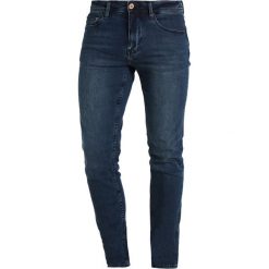 Cristiano Ronaldo CR7 Jeans Skinny Fit indigo. Niebieskie jeansy męskie relaxed fit marki Cristiano Ronaldo CR7. Za 289,00 zł.