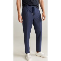 Mango Man - Spodnie Nolan. Niebieskie spodnie męskie Mango Man, bez wzorów, z elastanu. Za 199,99 zł.
