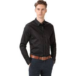 Armani Exchange Koszula Czarny. Czarne koszule męskie Armani Exchange, l, bez wzorów, z elastanu, bez kołnierzyka, z długim rękawem. Za 362,95 zł.