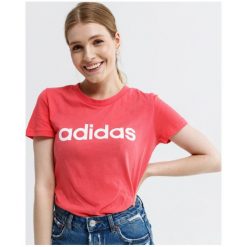 Adidas Koszulka Ss W E Lin Slim T , różowy, rozmiar L. Różowe koszulki damskie Adidas, s, z nadrukiem, z bawełny, z okrągłym kołnierzem. W wyprzedaży za 69,99 zł.