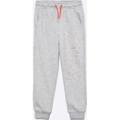 Puma - Spodnie dziecięce 128-176 cm. Szare legginsy dziewczęce Puma, bez wzorów, z bawełny, sportowe. W wyprzedaży za 69,90 zł.