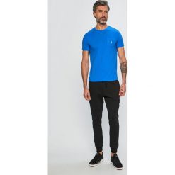 Polo Ralph Lauren - Spodnie. Czarne spodnie męskie Polo Ralph Lauren, na co dzień, s, bez wzorów, z elastanu. W wyprzedaży za 449,90 zł.