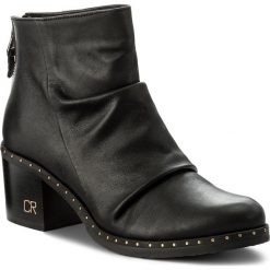 Botki CARINII - B4281/N L23-000-POL-861. Czarne buty zimowe damskie marki Carinii, ze skóry ekologicznej. W wyprzedaży za 239,00 zł.