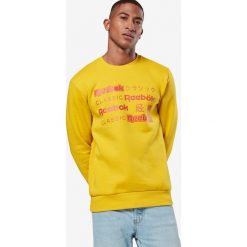 Reebok Classic Classics International Bluza Żółty. Żółte bluzy męskie Reebok Classic, l, z nadrukiem, z bawełny, bez kołnierzyka, bez rękawów, bez kaptura. Za 240,95 zł.