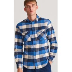 Koszula w kratę - Niebieski. Niebieskie koszule męskie Reserved, s, bez wzorów, bez kołnierzyka, bez rękawów. W wyprzedaży za 59,99 zł.