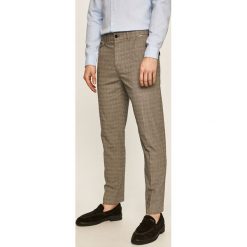 Calvin Klein - Spodnie. Szare spodnie męskie Calvin Klein, na co dzień, bez wzorów, z elastanu. Za 599,90 zł.