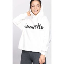 Biała Bluza Stealing Through. Białe bluzy rozpinane damskie Born2be, l, z kapturem. Za 49,99 zł.
