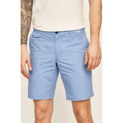 Calvin Klein - Szorty. Niebieskie spodenki i szorty męskie Calvin Klein, bez wzorów, z bawełny, casualowe. Za 349,90 zł.