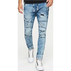 Jeansy SLIM JOGGER - Niebieski. Niebieskie jeansy męskie Cropp, m, bez wzorów. Za 129,99 zł.
