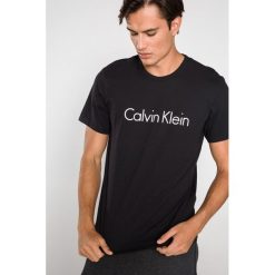 Calvin Klein Koszulka do spania Czarny. Czarne koszulki męskie Calvin Klein, m, bez wzorów, z bawełny, bez kołnierzyka, bez rękawów. Za 163,95 zł.