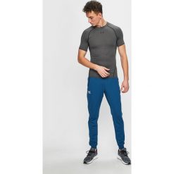 Under Armour - Spodnie. Niebieskie spodnie męskie Under Armour, m, bez wzorów, z elastanu, sportowe. W wyprzedaży za 159,90 zł.