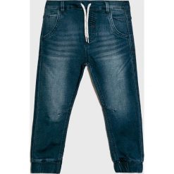 Blukids - Spodnie dziecięce 104-134 cm. Niebieskie spodnie chłopięce marki Blukids, bez wzorów, z elastanu, casualowe. W wyprzedaży za 59,90 zł.