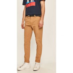 Tommy Jeans - Spodnie. Zielone spodnie męskie Tommy Jeans, na co dzień, w paski, z elastanu. Za 449,90 zł.