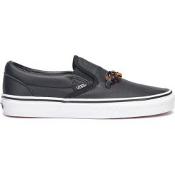 Vans Classic Slip On Buty Czarny. Czarne trampki i tenisówki damskie Vans, bez wzorów, ze skóry, bez zapięcia. Za 376,95 zł.