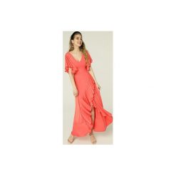 Sukienka Juanita - koral. Pomarańczowe sukienki damskie marki Madnezz, s, bez wzorów, z elastanu, bez kołnierzyka, bez rękawów, midi, kopertowe. Za 445,00 zł.