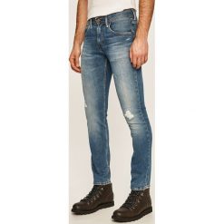 Tommy Hilfiger - Jeansy Denton. Niebieskie jeansy męskie TOMMY HILFIGER, bez wzorów, z obniżonym stanem. Za 579,90 zł.