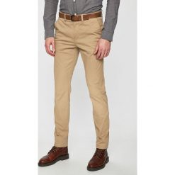 Tom Tailor Denim - Spodnie. Niebieskie spodnie męskie w paski, z elastanu. W wyprzedaży za 149,90 zł.