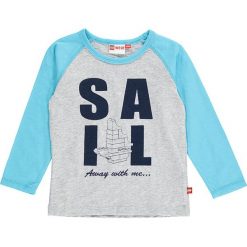 Koszulka "Tyler 306" w kolorze szaro-turkusowym. Szare t-shirty chłopięce marki LEGO Wear, z aplikacjami, z bawełny, z długim rękawem. W wyprzedaży za 45,95 zł.