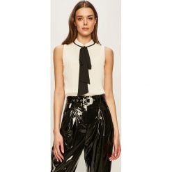 Dkny - Bluzka. Białe bluzki damskie DKNY, na co dzień, s, bez wzorów, z poliesteru, ze stójką, bez rękawów. Za 299,90 zł.