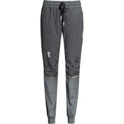 Spodnie ON Running RUNNING-PANTS WOMAN. Niebieskie spodnie damskie On Running, bez wzorów, z materiału. Za 750,00 zł.