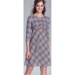 Sukienka w kratę odcięta pod linią biustu. Sukienki damskie NIFE, xl, bez wzorów, z elastanu, bez kołnierzyka, bez rękawów, rozkloszowane. Za 239,00 zł.