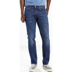 Dżinsy 511 krój slim, denim ze stretchem. Szare jeansy męskie slim marki Levi's®, l, z bawełny, z długim rękawem, długie, z kapturem. Za 562,80 zł.
