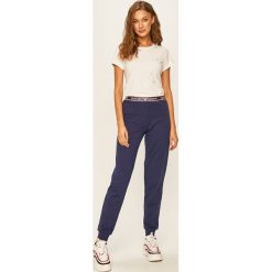 Emporio Armani - Spodnie. Niebieskie spodnie damskie Emporio Armani, s, z elastanu. Za 359,90 zł.