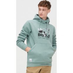 Bluza kangurka z kapturem - Turkusowy. Niebieskie bluzy męskie Cropp, s, bez wzorów, z kapturem, bez rękawów, z kapturem. Za 129,99 zł.