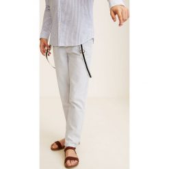 Mango Kids - Spodnie dziecięce Jay 110-164 cm. Szare spodnie chłopięce Mango Kids, bez wzorów, z bawełny, casualowe. W wyprzedaży za 39,90 zł.