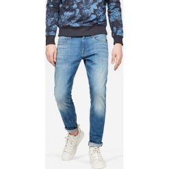 G-Star Raw - Jeansy. Niebieskie jeansy męskie G-Star RAW, z aplikacjami, retro. W wyprzedaży za 299,90 zł.