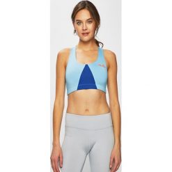 Ellesse - Biustonosz. Niebieskie biustonosze sportowe damskie Ellesse, bez wzorów, z elastanu. W wyprzedaży za 69,90 zł.