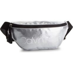 Saszetka nerka CALVIN KLEIN - Ck Essentials Waistbag K60K605304 067. Szare nerki damskie Calvin Klein, bez wzorów, z materiału, młodzieżowe, bez dodatków. Za 229,00 zł.
