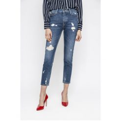 Tommy Jeans - Jeansy Izzy. Niebieskie rurki damskie marki Tommy Jeans, z podwyższonym stanem. Za 599,90 zł.