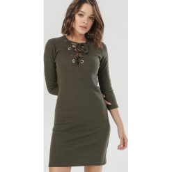 Khaki Sukienka Opysis. Brązowe sukienki damskie Born2be, s, bez wzorów, z dzianiny, bez kołnierzyka, bez rękawów. Za 69,99 zł.
